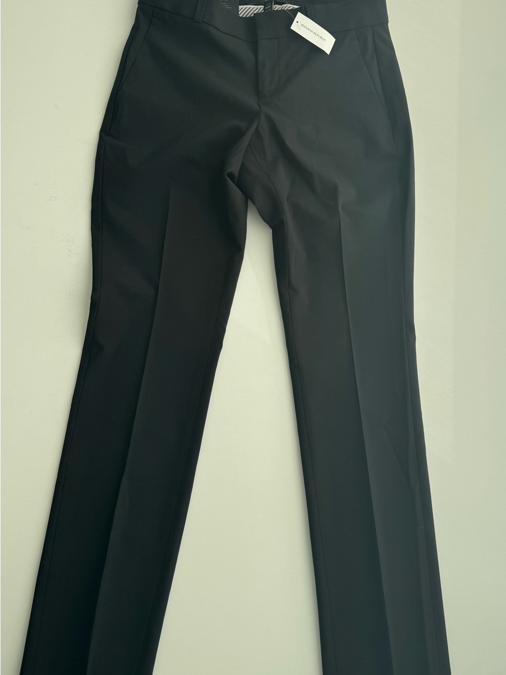Banana Republic black mid-rise Logan Pants in petite size0. Brand new with tags.